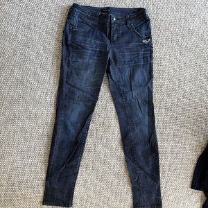 Bebe Distressed Dark Blue Skinny Jeans